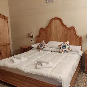  Alojamento de Acomodação e Pequeno-almoço 214 Boutique